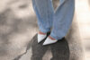 Baltas Prada zīmola kurpes ar smailiem purngaliem